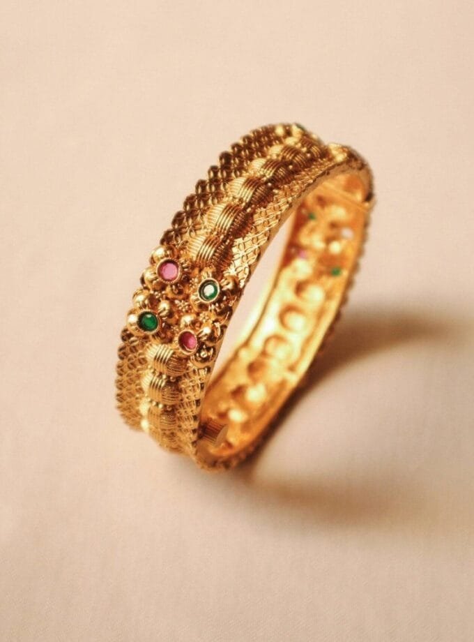21 gold-plated bangle
