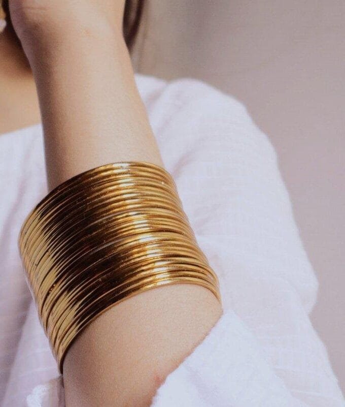 Golden steel bangles