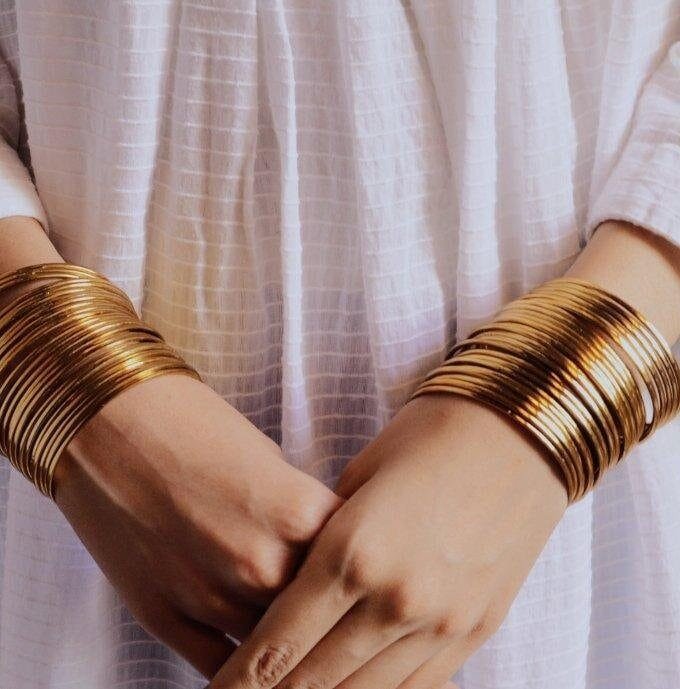 Golden steel bangles