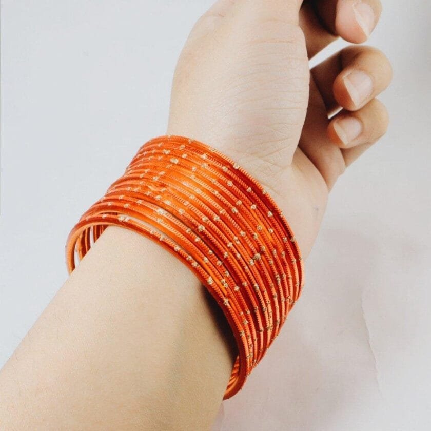Orange metal bangles