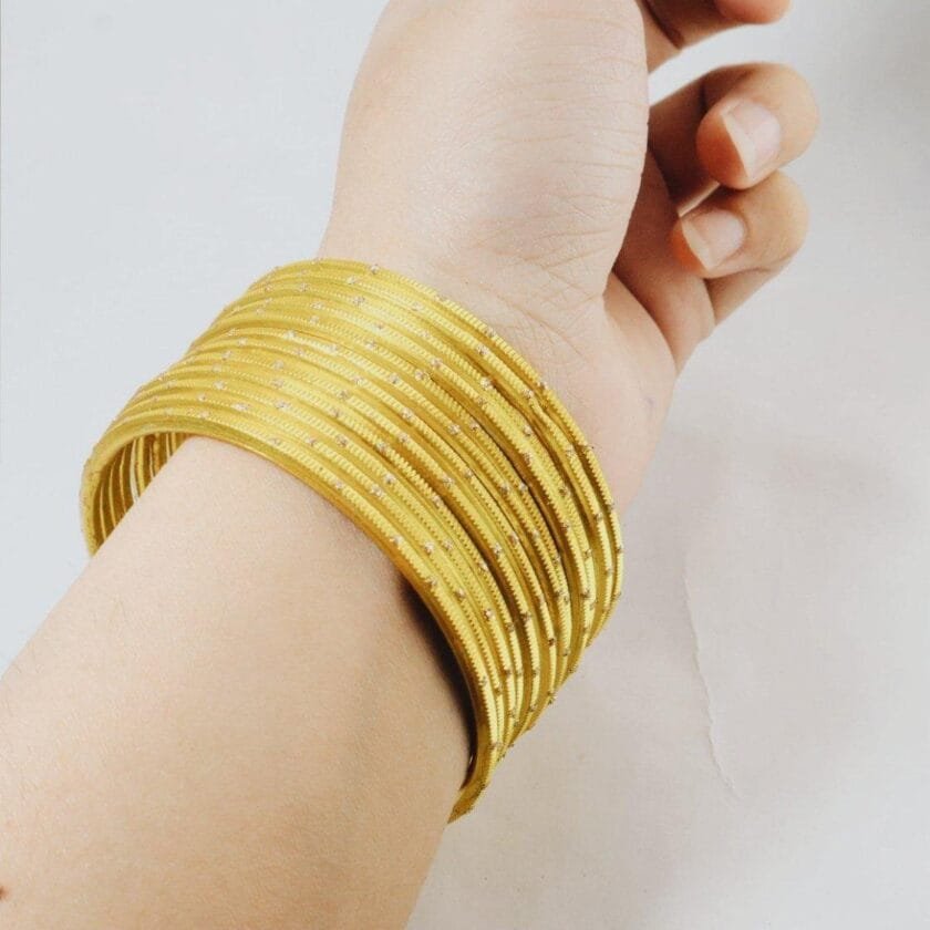Yellow metal bangles