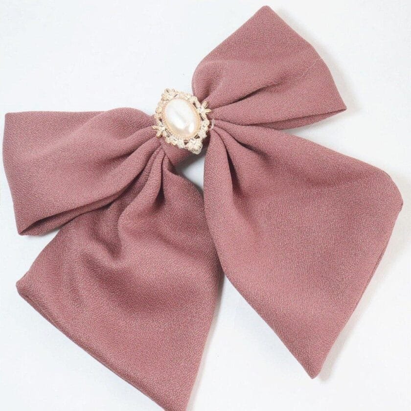Bow clip pearl stone pink