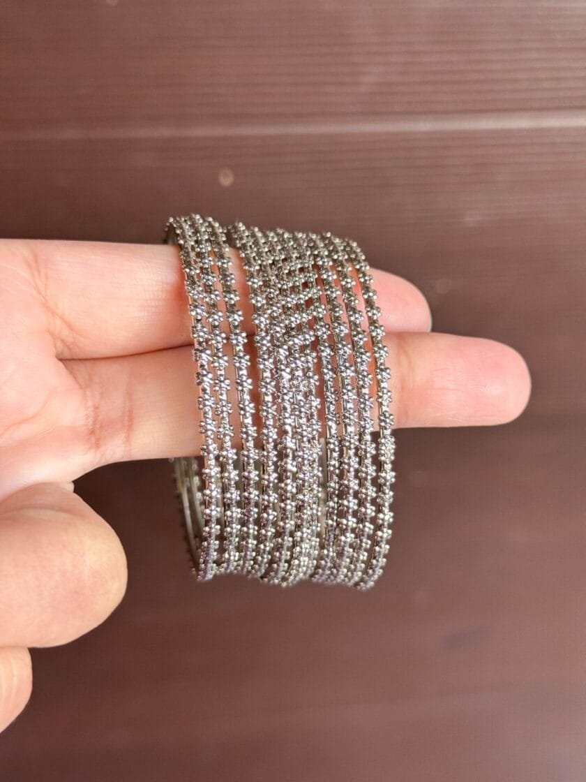 Silver floral steel Bangles