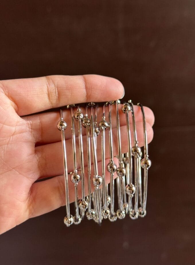 Silver moti bangles
