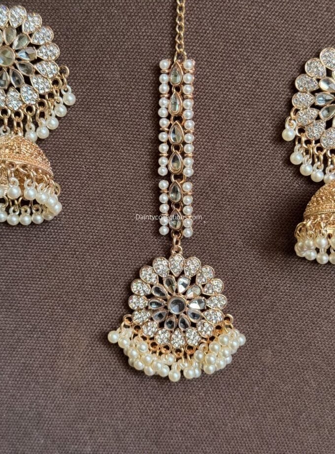 Kundan Matha tikka with rose gold jhumkay