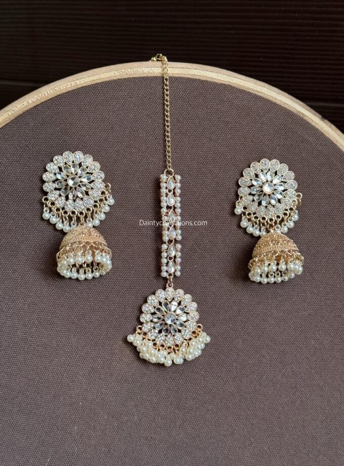 Kundan Matha tikka with rose gold jhumkay